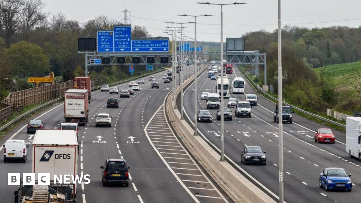 A section of the M4 with lorries and cars using all four lanes, with no hard shoulder