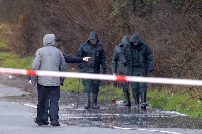 PSNI officers searching at the scene near Moy in County Tyrone