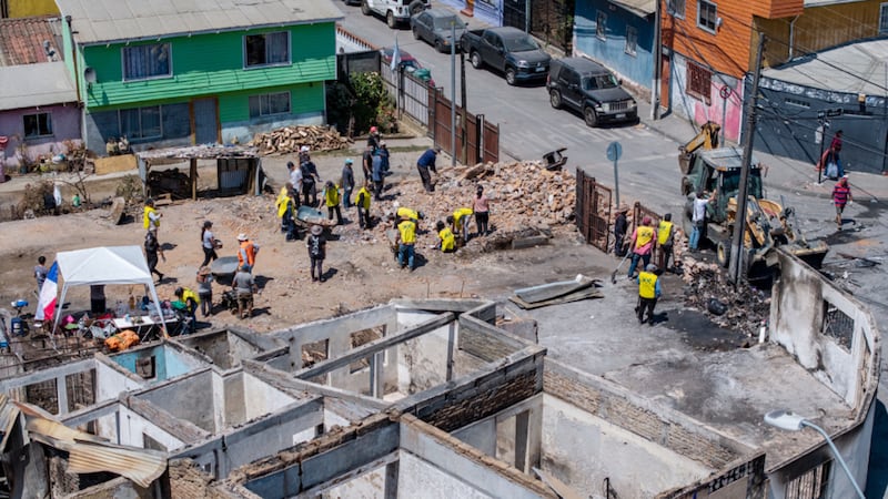 Volunteers from The Church of Jesus Christ of Latter-day Saints work to help clean-up after wildfires in the Biobío Region, southern Chile, on Saturday, Jan. 24, 2026.
