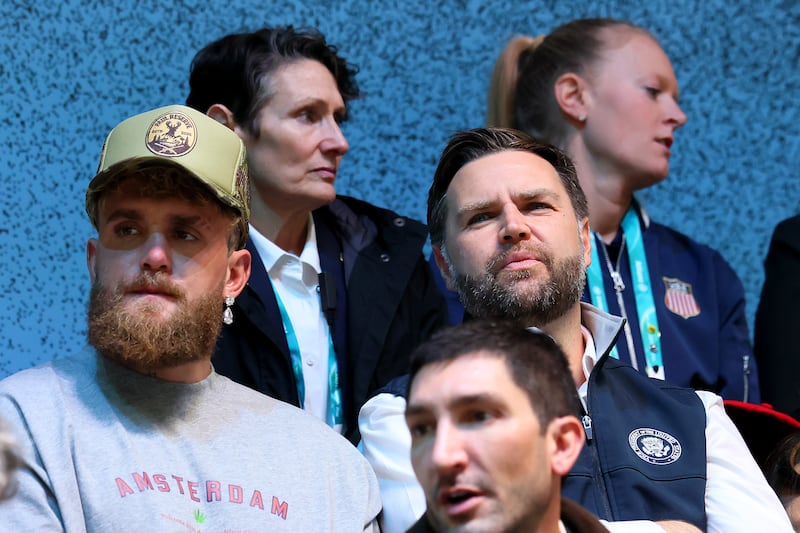 Boxer Jake Paul and US Vice President JD Vance are seen in the stand during the Women's Preliminary Round Group A match between Finland and United States on day one of the Milano Cortina 2026 Winter Olympic games at Milano Rho Ice Hockey Arena on February 07, 2026 in Milan, Italy.
