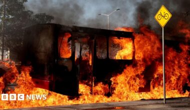 A recruitment poster in the Russian town of Yelets promises big sums of money for anyone who joins up. It shows a man in uniform pointing a rifle to the right