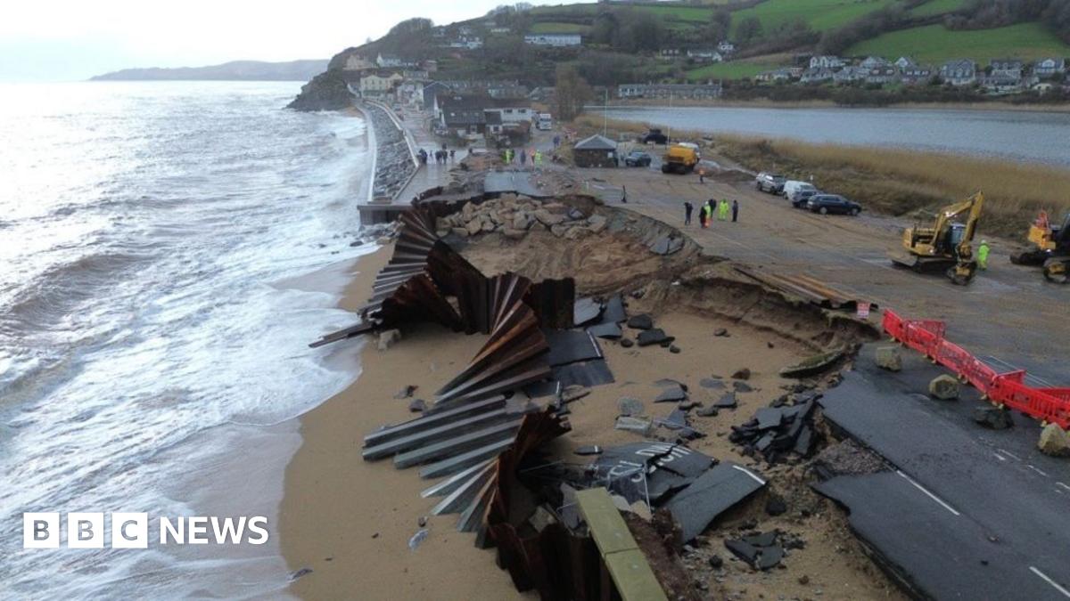 The A379 Slapton Line between Torcross and Slapton has washed away. The image shows a gaping hole in the street.
