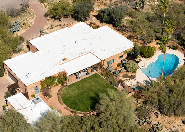 Aerial view of a desert home with a pool and garden, related to FBI official insights on Nancy Guthrie disappearance. Aerial view of a desert home with a pool and garden, related to FBI official insights on Nancy Guthrie disappearance.