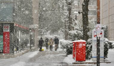 Snow blankets Tokyo as powerful storm system tightens grip on Japan