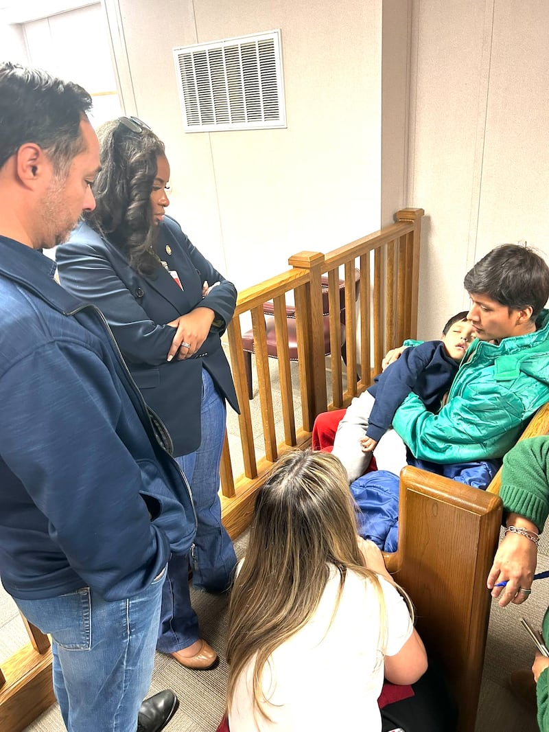 Liam Conejo Ramos lies unresponsive in his father's arms in ICE detention during the visit by Reps. Jasmine Crockett and Joaquin Castro.