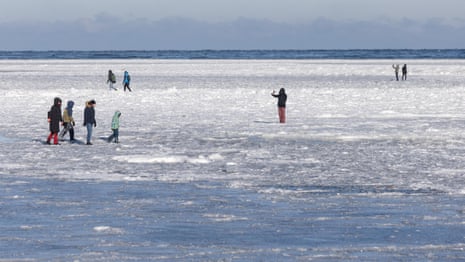 People walk on frozen Baltic Sea as extreme cold hits Poland – video