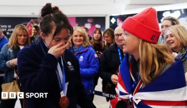 Winter Olympics homecoming: Team GB athletes arrive back in UK after record gold medals