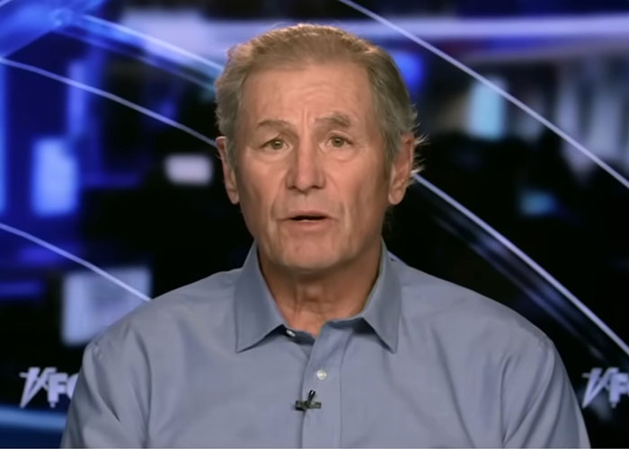 FBI official in a blue shirt speaking on camera, discussing new insights about Nancy Guthrie disappearance case. FBI official in a blue shirt speaking on camera, discussing new insights about Nancy Guthrie disappearance case.