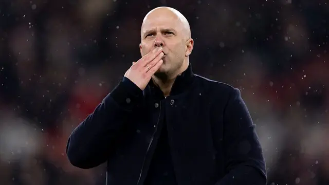 Arne Slot blowing a kiss to the crowd