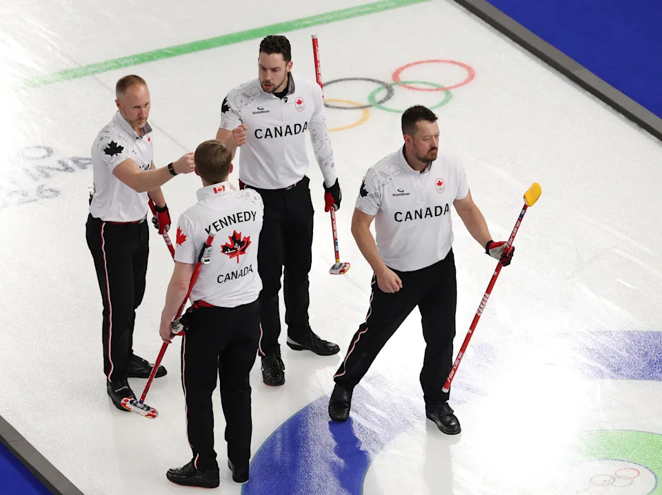 Milano Cortina 2026 Olympics - Curling - Men's Round Robin Session 11 - Italy vs Canada - Cortina Curling Olympic Stadium, Cortina d'Ampezzo, Italy - February 18, 2026. Marc Kennedy of Canada, Brad Jacobs of Canada, Brett Gallant of Canada and Ben Hebert of Canada react after winning the match against Italy REUTERS/Issei Kato