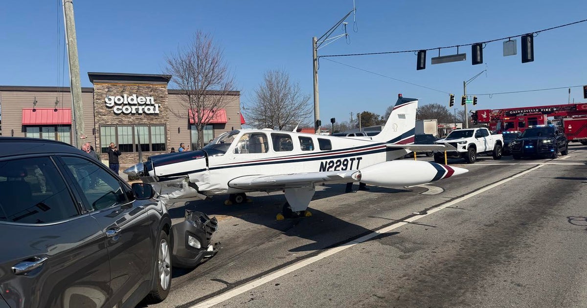 Small plane crashes into vehicles during emergency landing in Gainesville, just north of Atlanta
