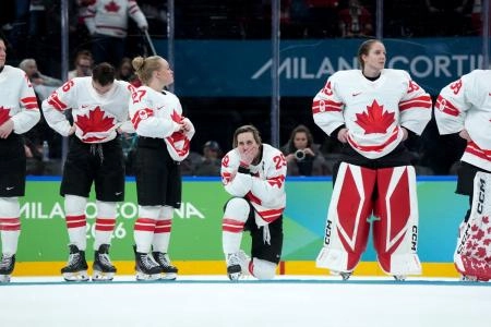 Team Canada forward Marie-Philip Poulin poses after losing to Team USa in the Women's Ice Hockey Finals in Milan.