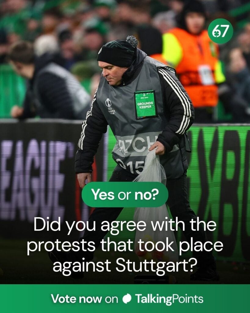 A steward is seen picking up tennis balls after Celtic fans have thrown them on to the pitch during the UEFA Europa League 2025/26 Knockout Play-off First Leg match between Celtic FC and VfB Stuttgart