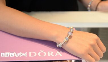 A close up of a gold chain on a set of scales in a jeweller in Hatton Gardens