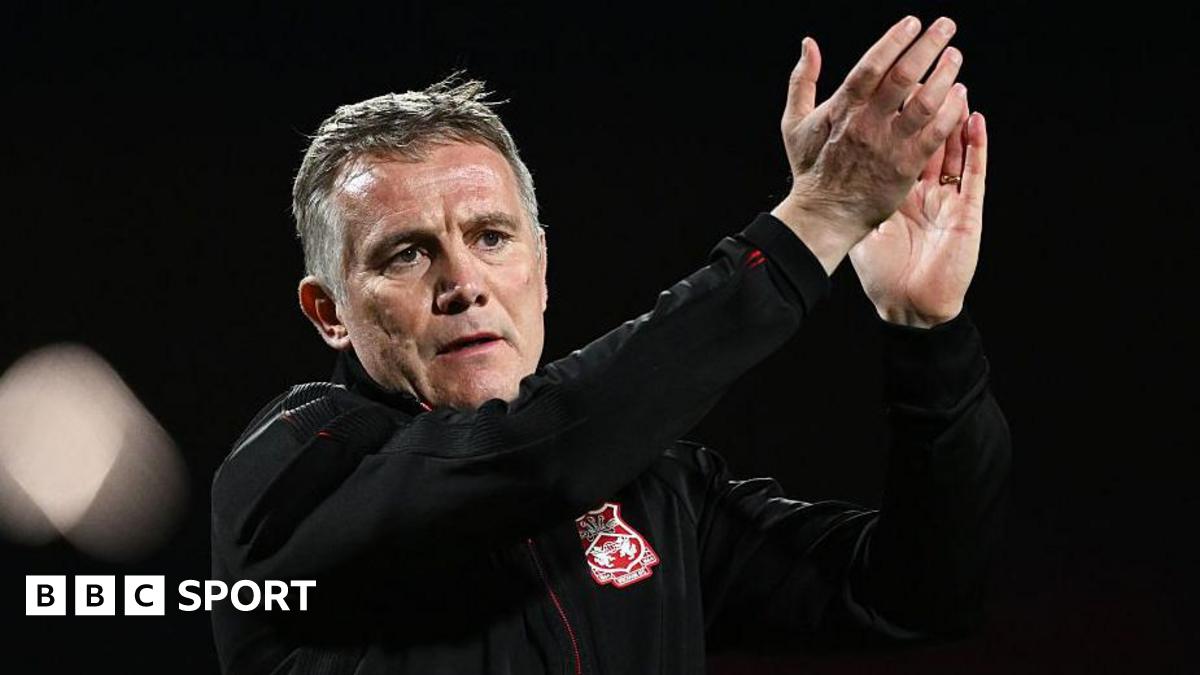 Wrexham manager Phil Parkinson applauds