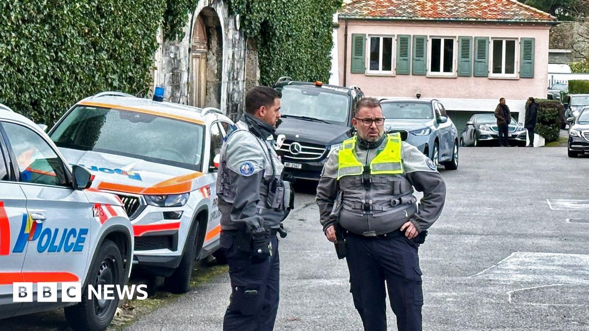 Police officers stand guard outside of the Omani ambassador's residence in Geneva, Switzerland, during indirect nuclear talks between the United States and Iran (17 February 2026)