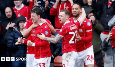 Wrexham goal scorer Nathan Broadhead (second left) celebrates with Lewis O'Brien and Zak Vyner (right)