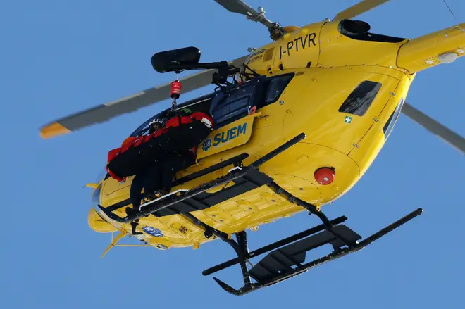 A mountain rescue helicopter is seen rescuing Lindsey Vonn
