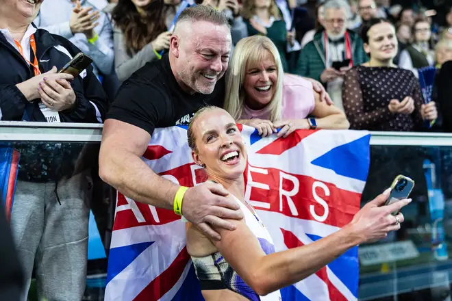 Britain's Keely Hodgkinson celebrates after breaking the indoor 800m world record.