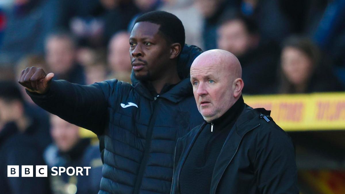 Marvin Bartley and David Martindale in the Livingston dugout