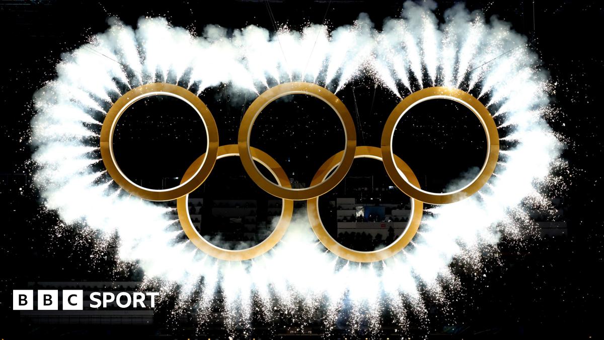 The Olympic rings come together as a fireworks display during the 2026 Winter Olympics opening ceremony in Milan-Cortina