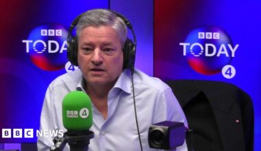 Ted Sarandos in the Radio 4 Today programme studio wearing headphones, in front of a microphone