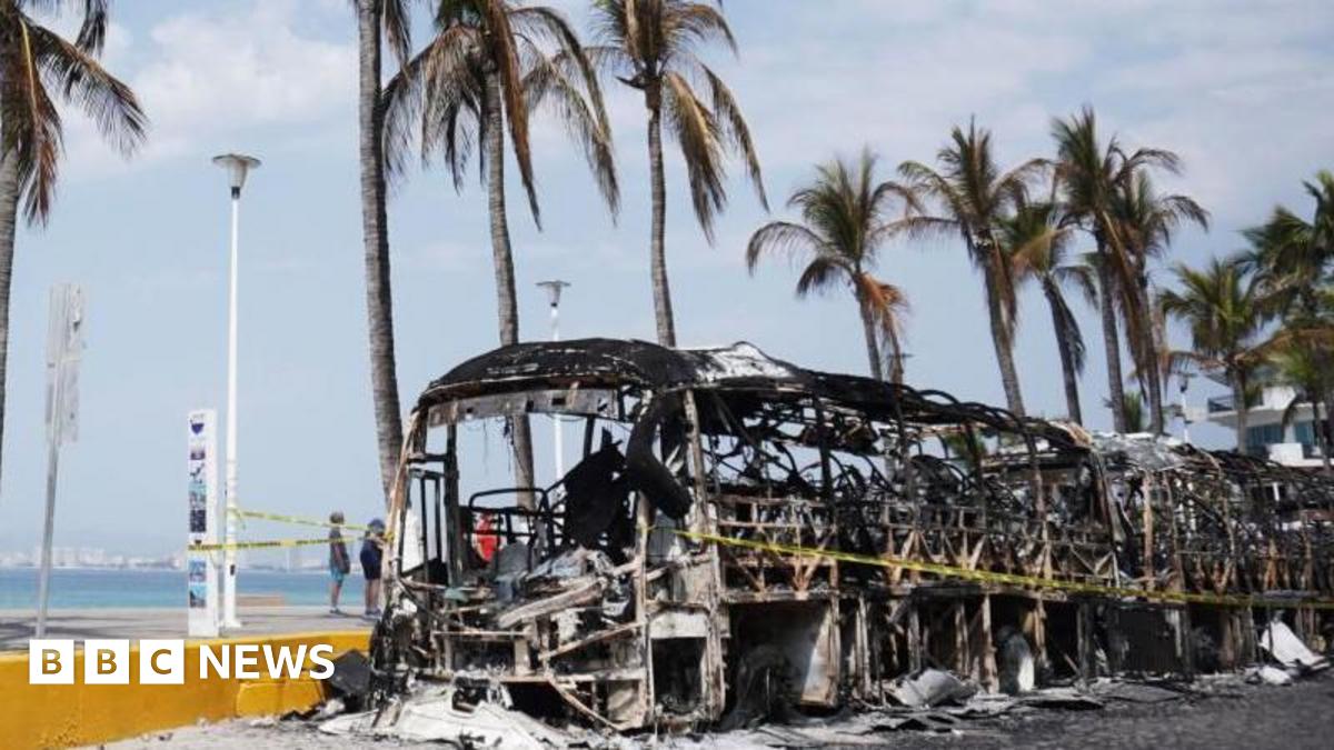 Burned out vehicles on the boardwalk in Puerto Vallarta, Mexico