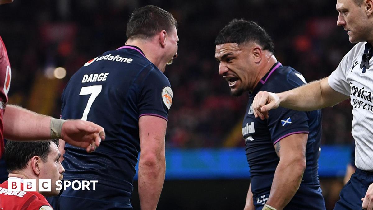 Sione Tuipulotu and Rory Darge of Scotland celebrates after George Turner of Scotland pushes the ball over to score a try