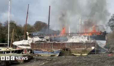 A treated illustration of a car with its headlights on