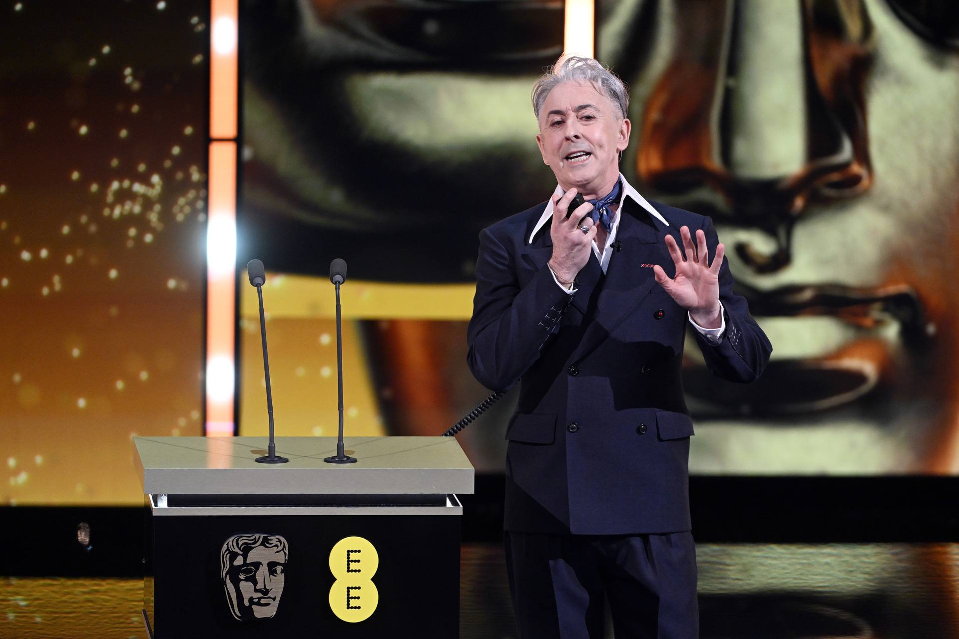 Host Alan Cumming speaks on stage during the EE BAFTA Film Awards 2026 at The Royal Festival Hall on February 22