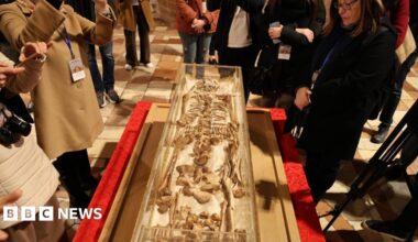 The body of St. Francis of Assisi is displayed to the public for the first time in history in a glass shrine in front of the altar of the Lower Basilica in Assisi, Italy, 21 February 2026.