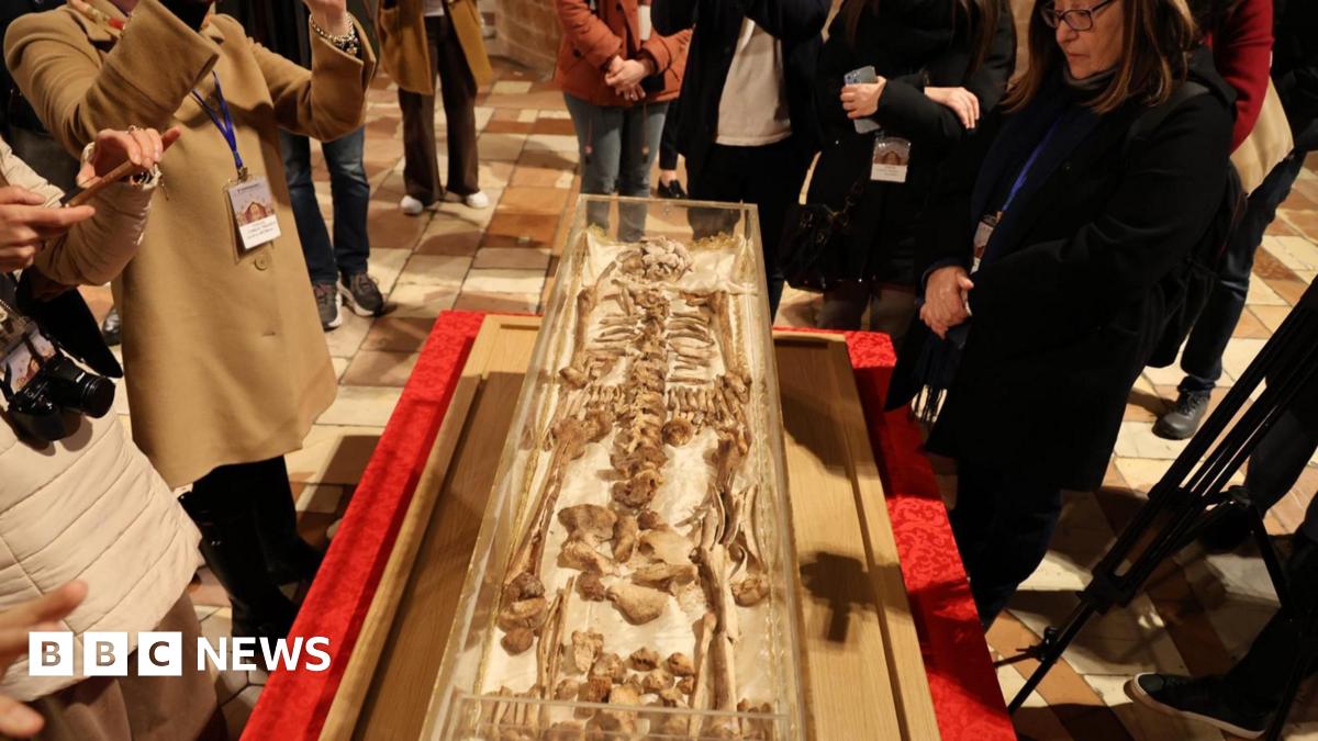 The body of St. Francis of Assisi is displayed to the public for the first time in history in a glass shrine in front of the altar of the Lower Basilica in Assisi, Italy, 21 February 2026.