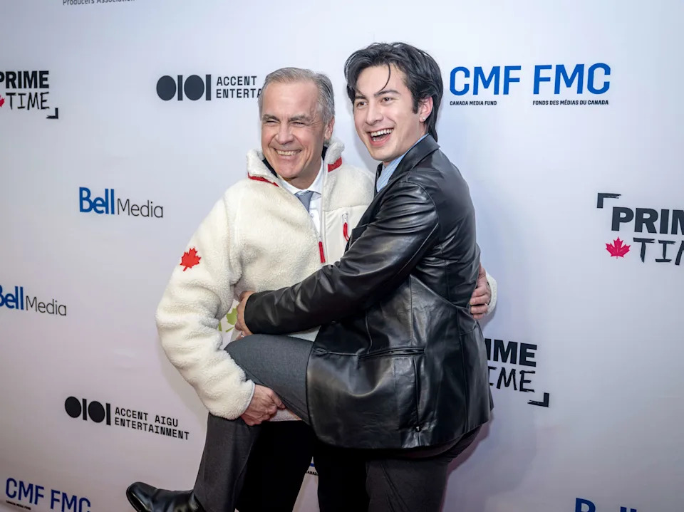OTTAWA, ONTARIO - JANUARY 29: Canadian Prime Minister Mark Carney and Hudson Williams arrive at the red carpet for In Conversation with 
