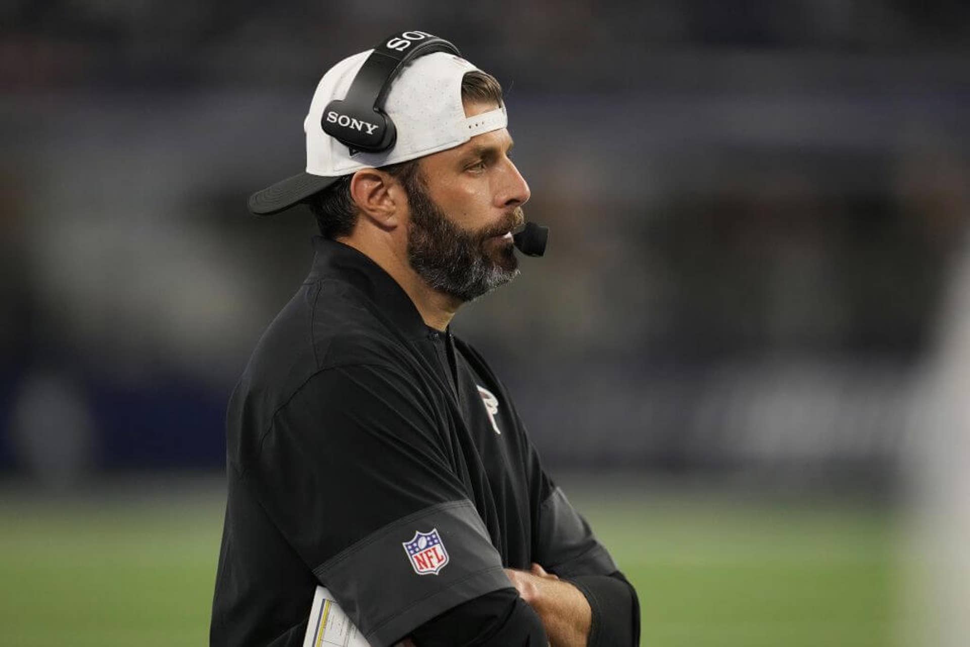 Atlanta Falcons defensive pass game coordinator Mike Rutenberg watches play against the Dallas Cowboys during a preseason NFL game on Aug. 22, 2025, in Arlington, Texas.