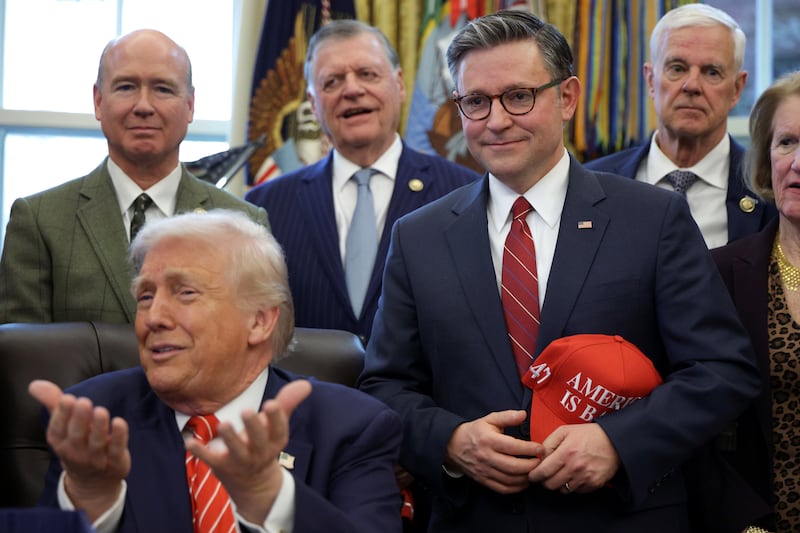 Speaker of the House Mike Johnson (R-LA) looks on as U.S. President Donald Trump speaks during a bill signing in the Oval Office of the White House on February 03, 2026 in Washington, DC.