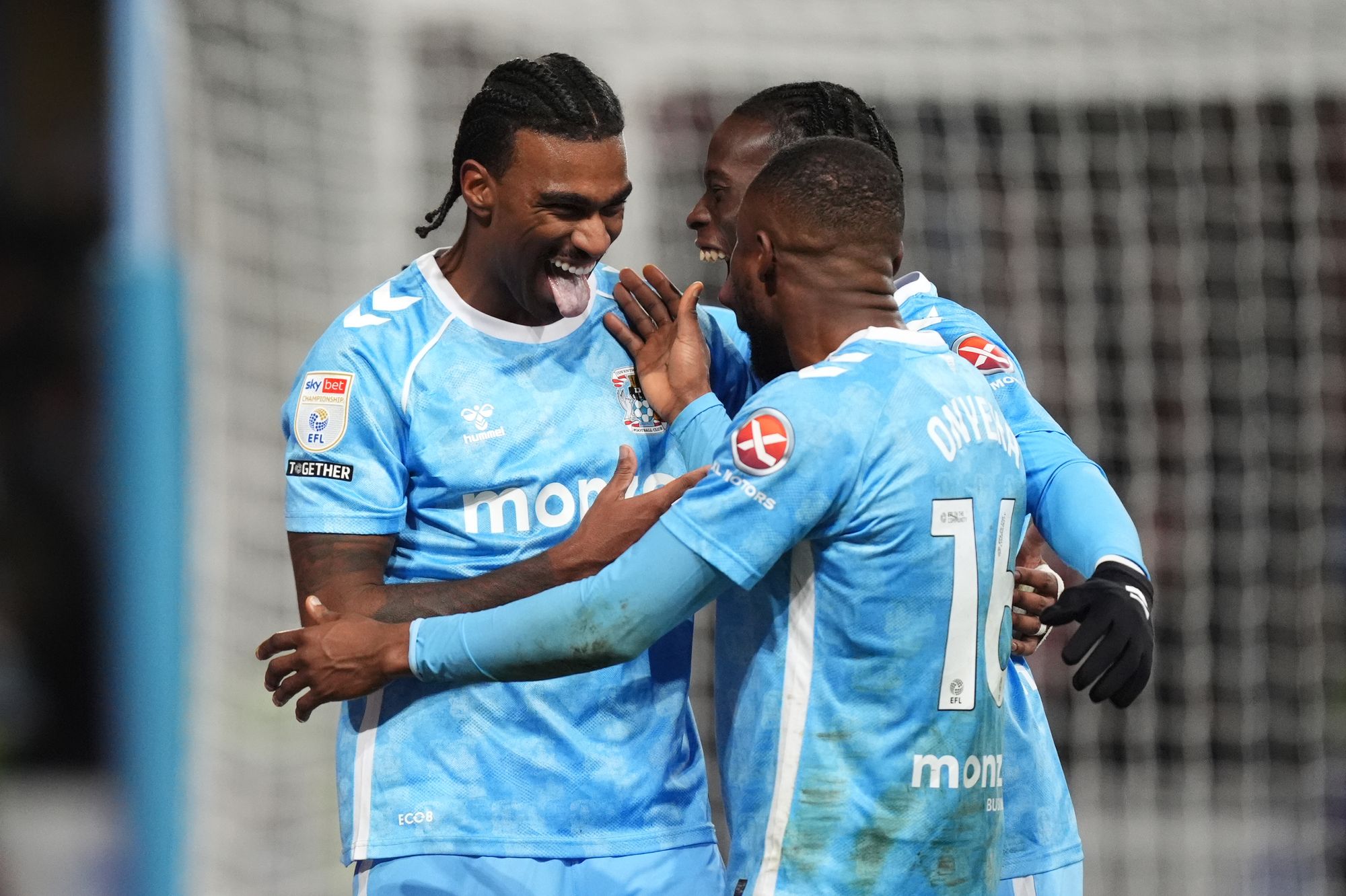 Coventry’s Haji Wright, left, celebrates scoring their side’s third goal from the penalty spot
