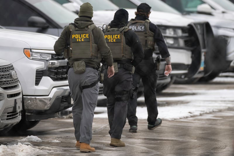ICE agents depart the Bishop Henry Whipple Federal Building on February 4, 2026 in Minneapolis, Minnesota.