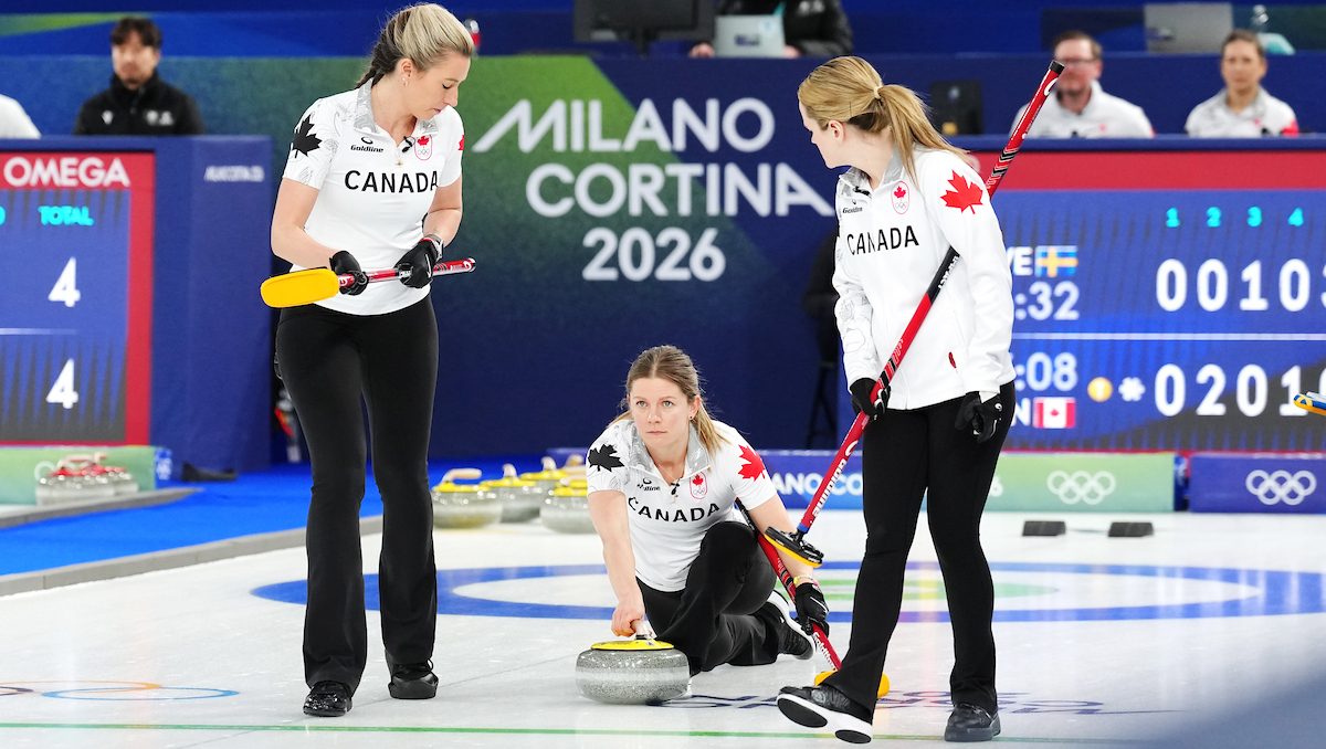 Last-rock victory keeps Canadian playoff hopes alive in women’s curling