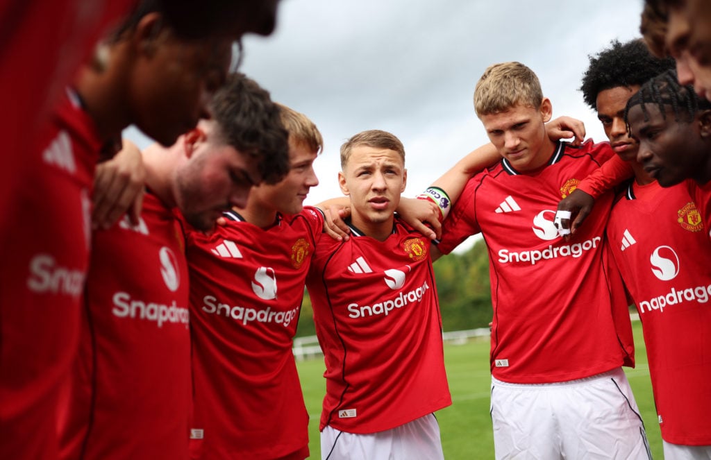 Amir Ibragimov leads team talk for Manchester United U18s.