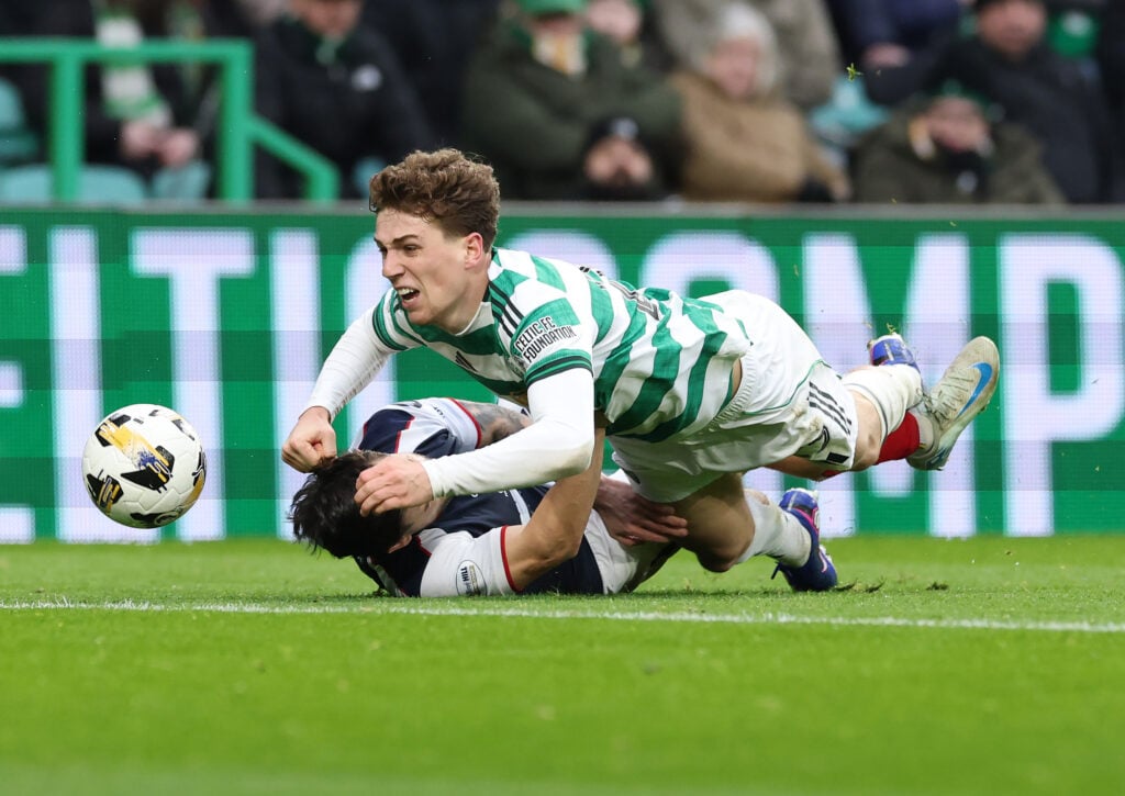 Arne Engels of Celtic vies with Leon McCann of Falkirk