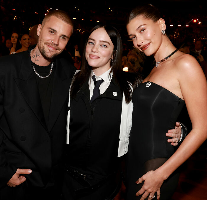 Billie Eilish at the Grammys with fellow celebrities, sparking controversy over her lavish lifestyle and public rant.