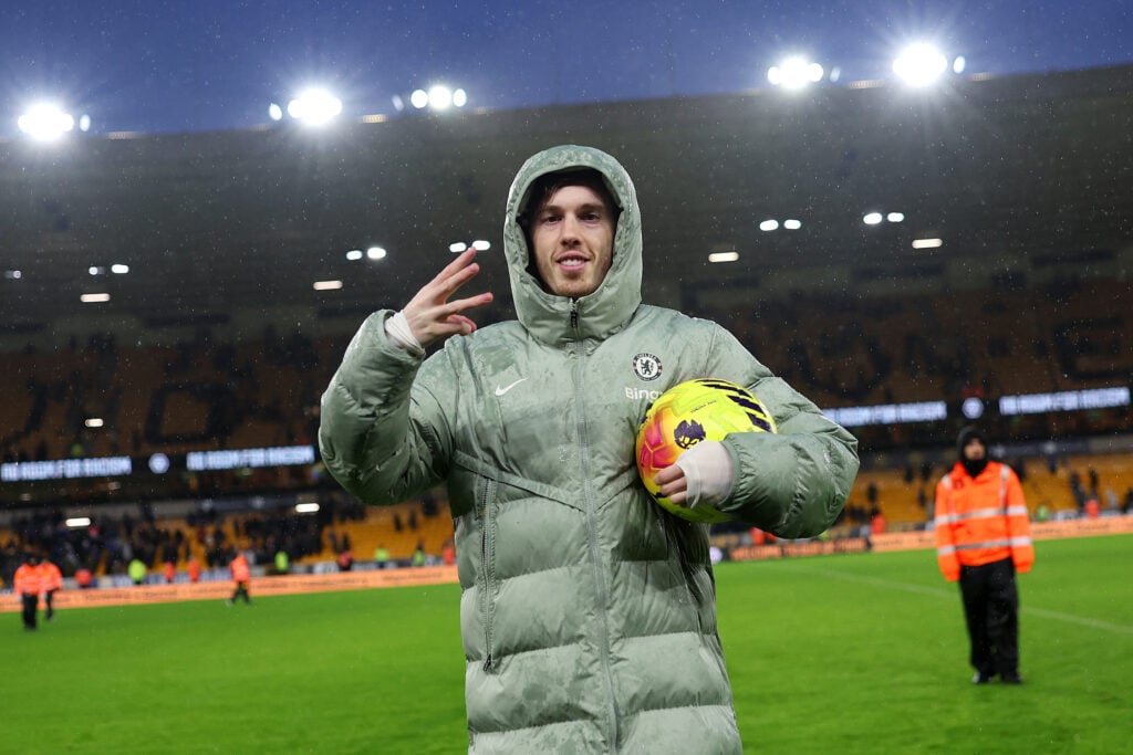 Cole Palmer of Chelsea pose with the match ball