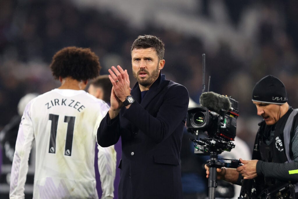 Michael Carrick claps Manchester United fans.