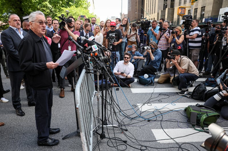 De Niro speaks during a news conference outside Trump's 2024 criminal trial in New York