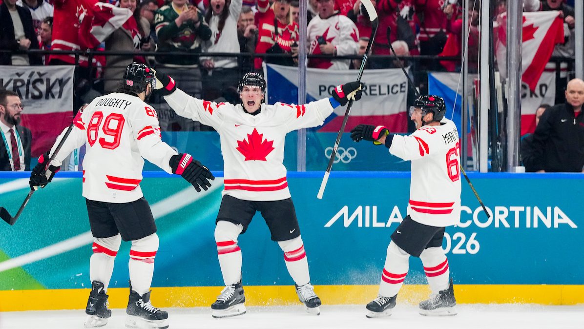 Bo Horvat celebrates after scoring a goal against Drew Doughty and Brad Marchand