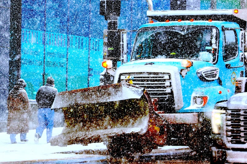 A city snowplow at the ready as intense bursts of lake-effect snow hit downtown Chicago, Jan. 30, 2026.