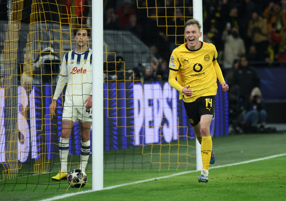 DORTMUND, GERMANY - FEBRUARY 17: Maximilian Beier of Borussia Dortmund celebrates scoring his team's second goal during the UEFA Champions League 2025/26 League Knockout Play-off First Leg match between Borussia Dortmund and Atalanta BC at BVB Stadion Dortmund on February 17, 2026 in Dortmund, Germany. (Photo by Alex Grimm/Getty Images)