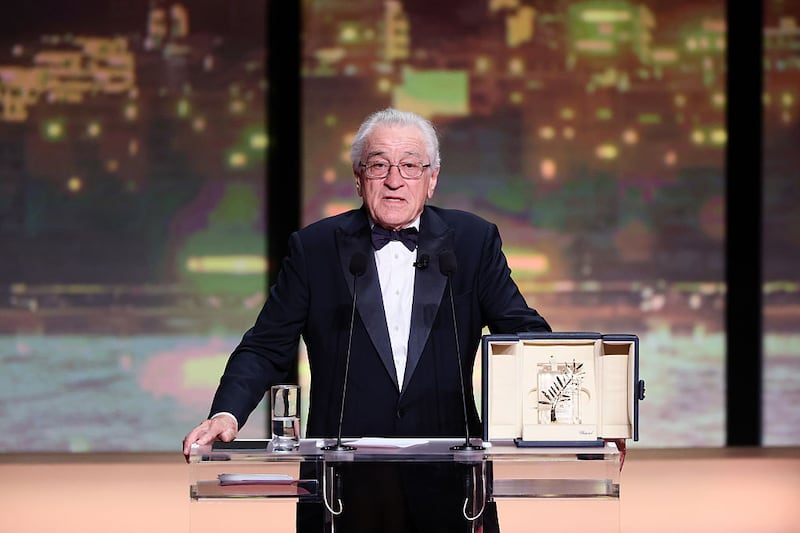 Robert De Niro accepts the honorary Palme d'Or onstage during the opening ceremony at the 78th annual Cannes Film Festival at the Palais de Festival on May 13, 2025 in Cannes, France.