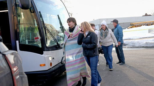 Shooter killed ex-wife and a son in Rhode Island ice rink attack, police say