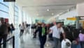 People running through Guadalajara airport